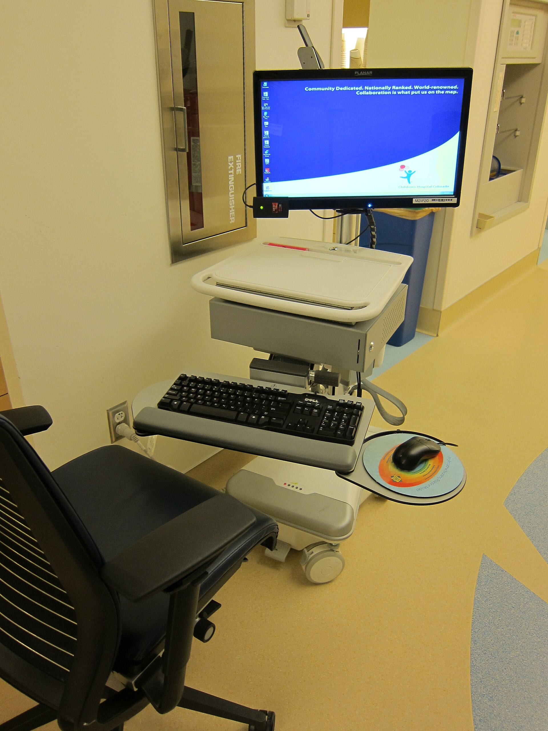 A mobile computer workstation inside a hospital